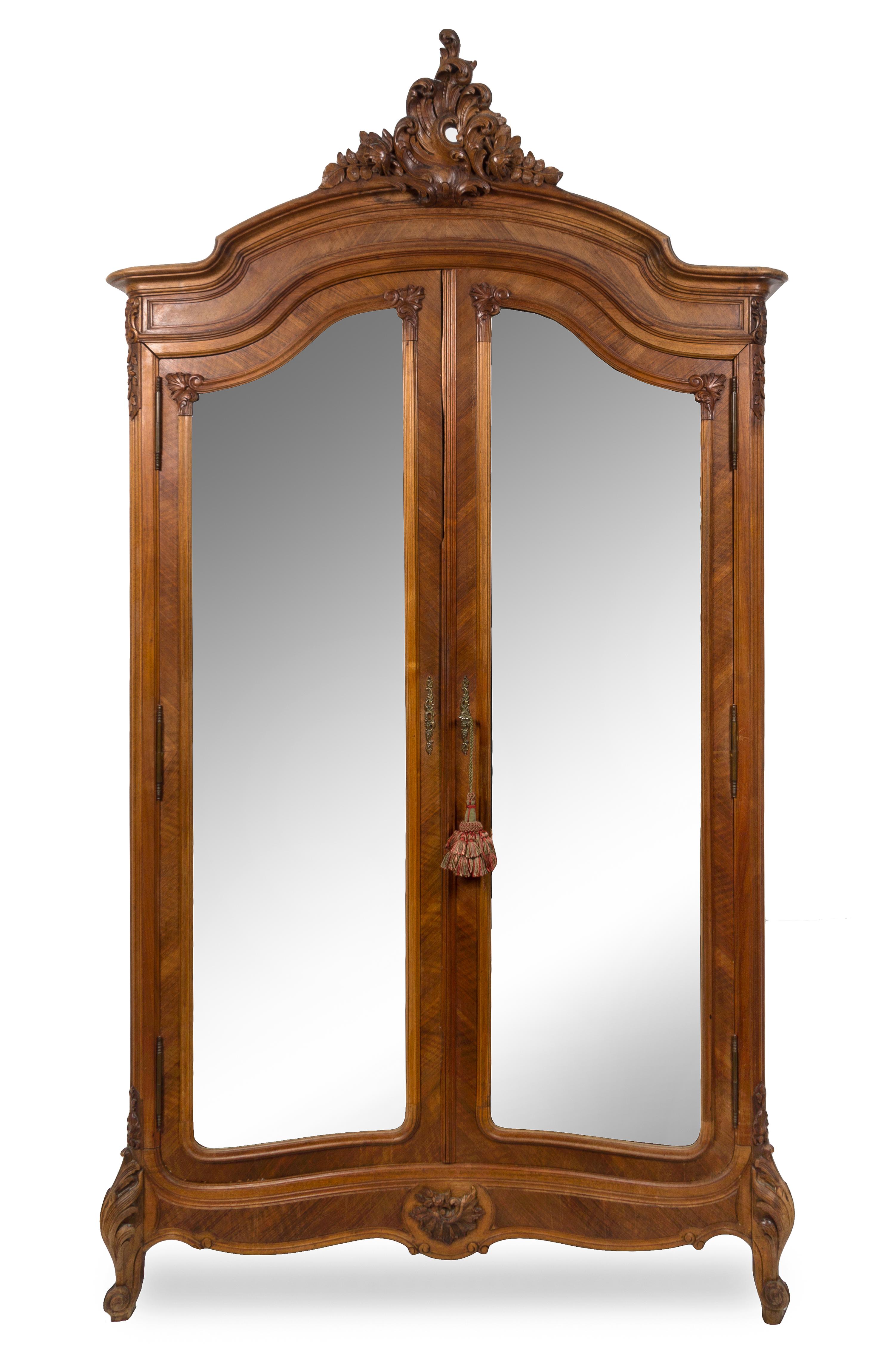 A Louis XV Style Walnut Armoire Height 100 1/2 x width 51 x depth 19 inches. — LATE 19TH CENTURY
