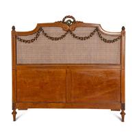 An Edwardian Satinwood and Polychrome Painted Headboard and Footboard