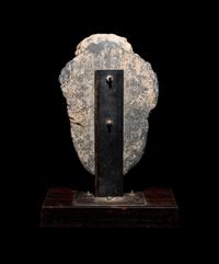 A Gandharan Grey Schist Buddha Head