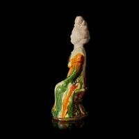 A Chinese sancai-glazed pottery figure of a seated woman 唐三彩仕女坐像 Tang dynasty ?