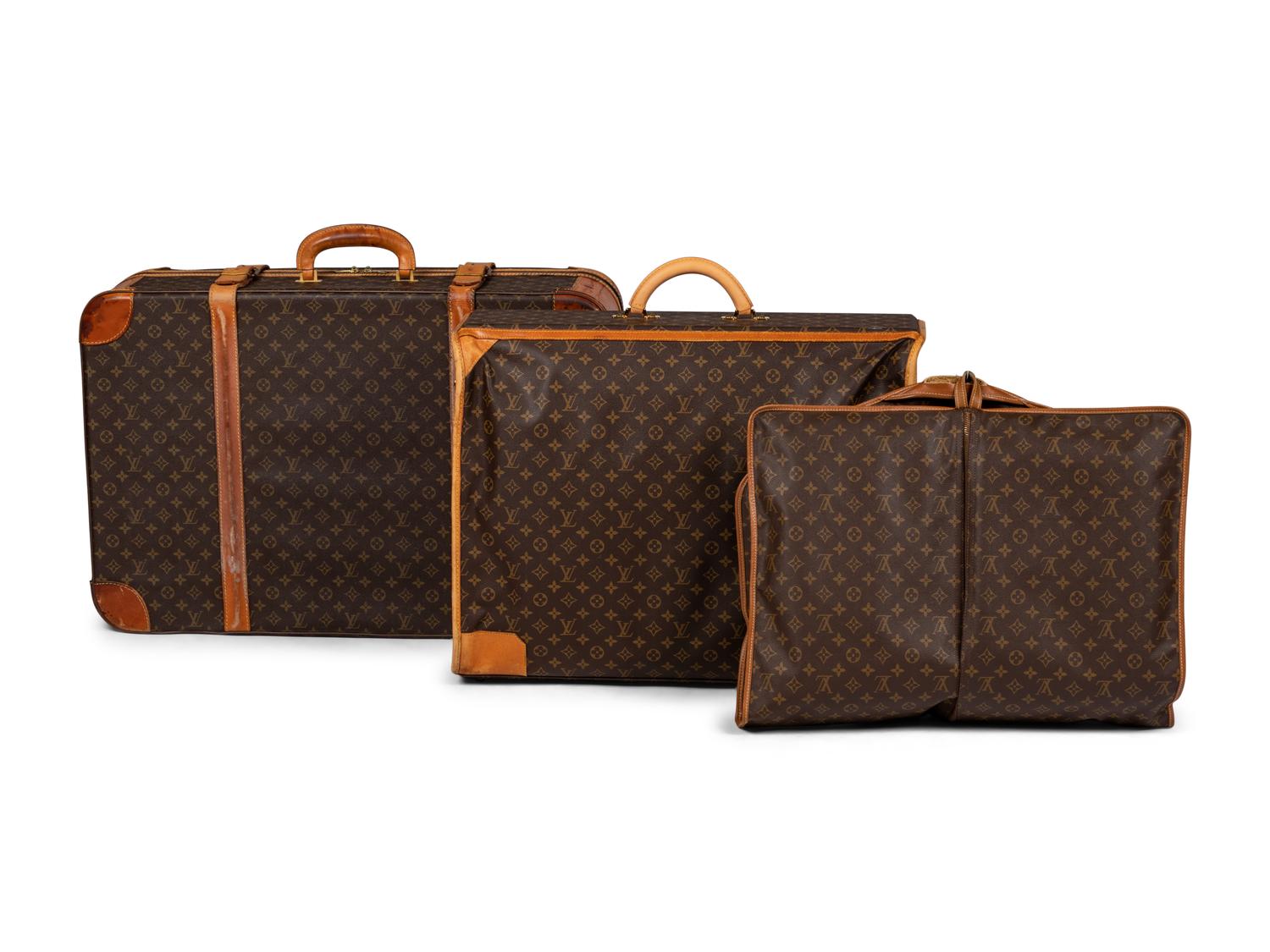Three Louis Vuitton Luggage Items
