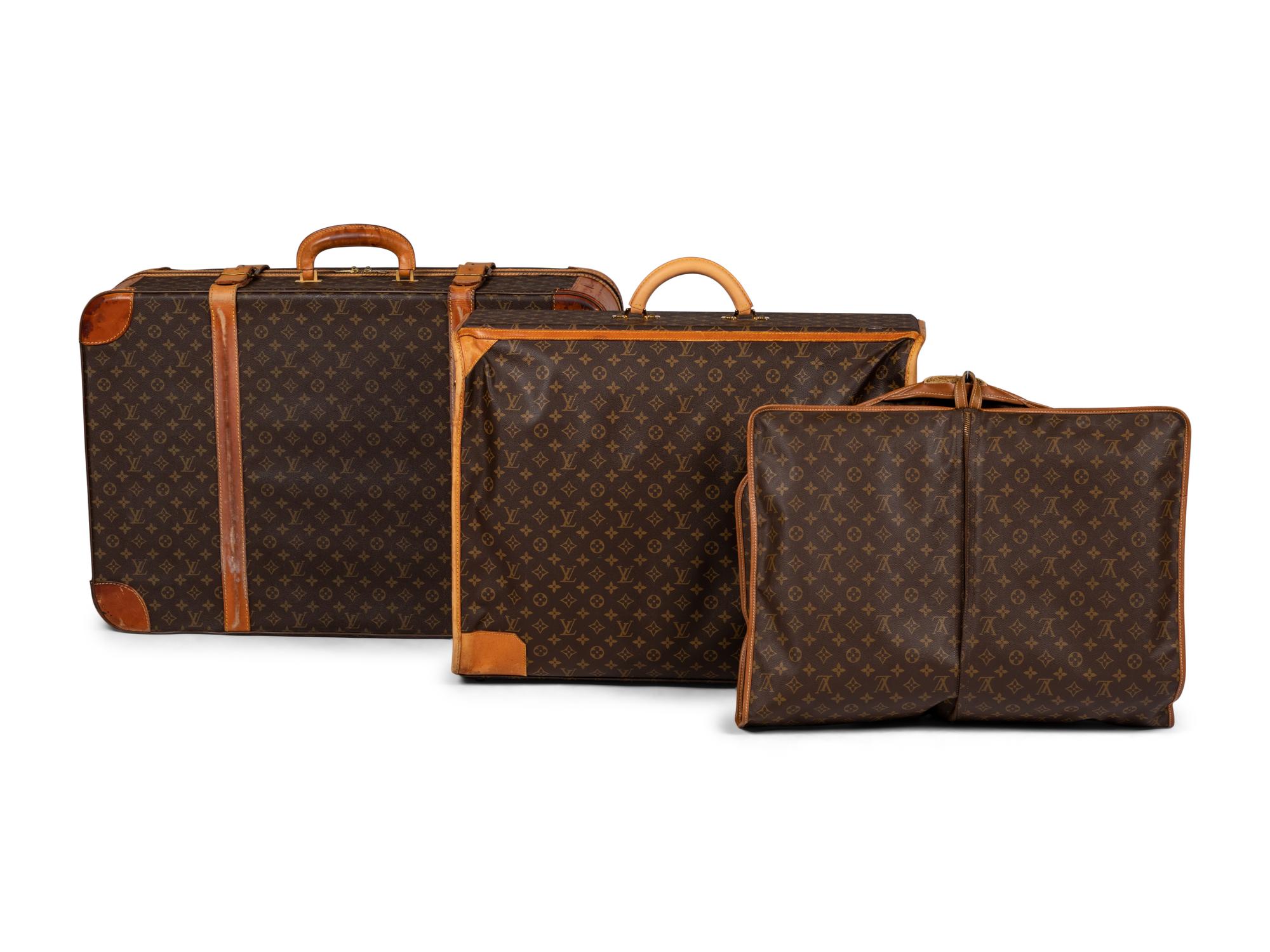 Three Louis Vuitton Luggage Items