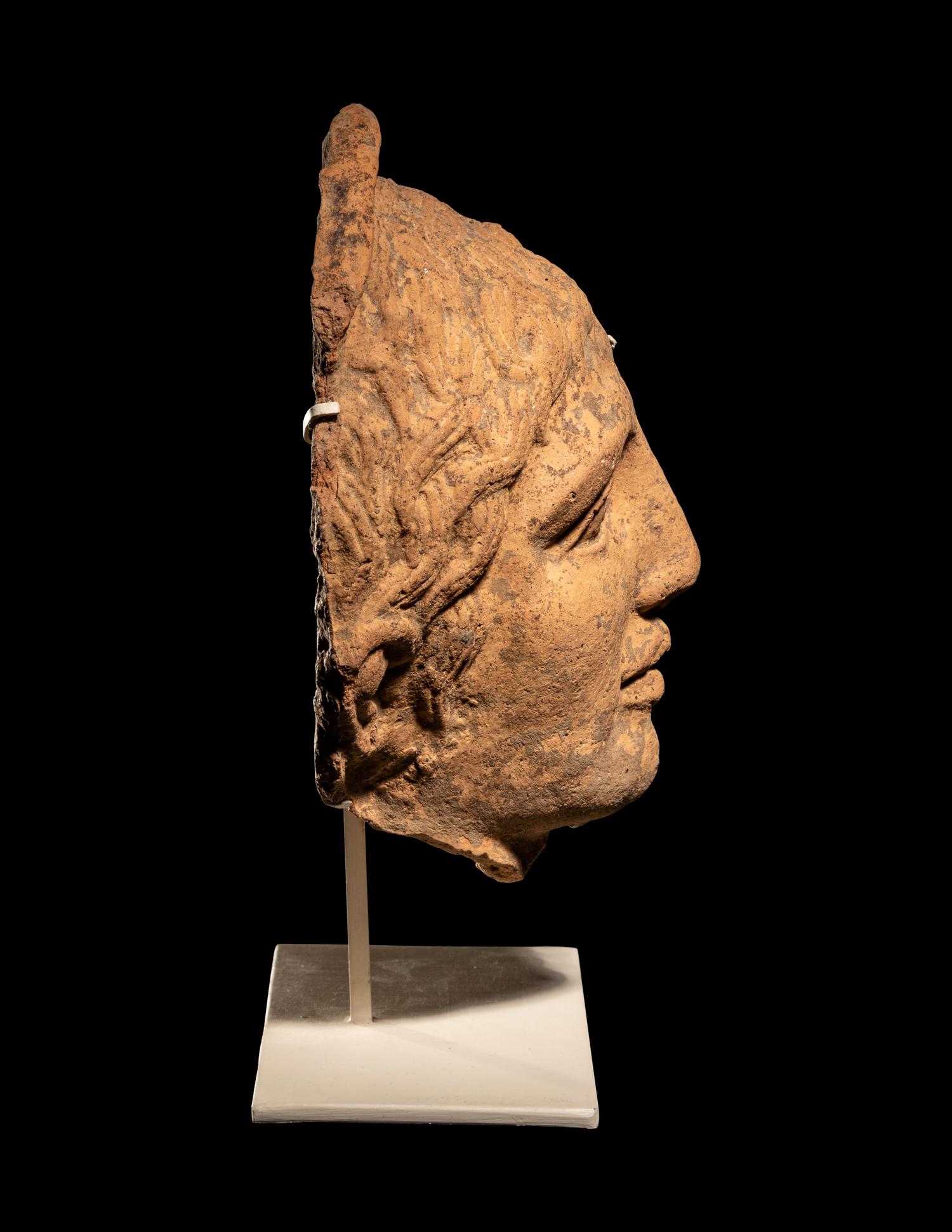 An Etruscan Terra Cotta Votive Half Head