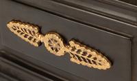 A Pair of Directoire Style Parcel Gilt Bronze Lion Ornaments