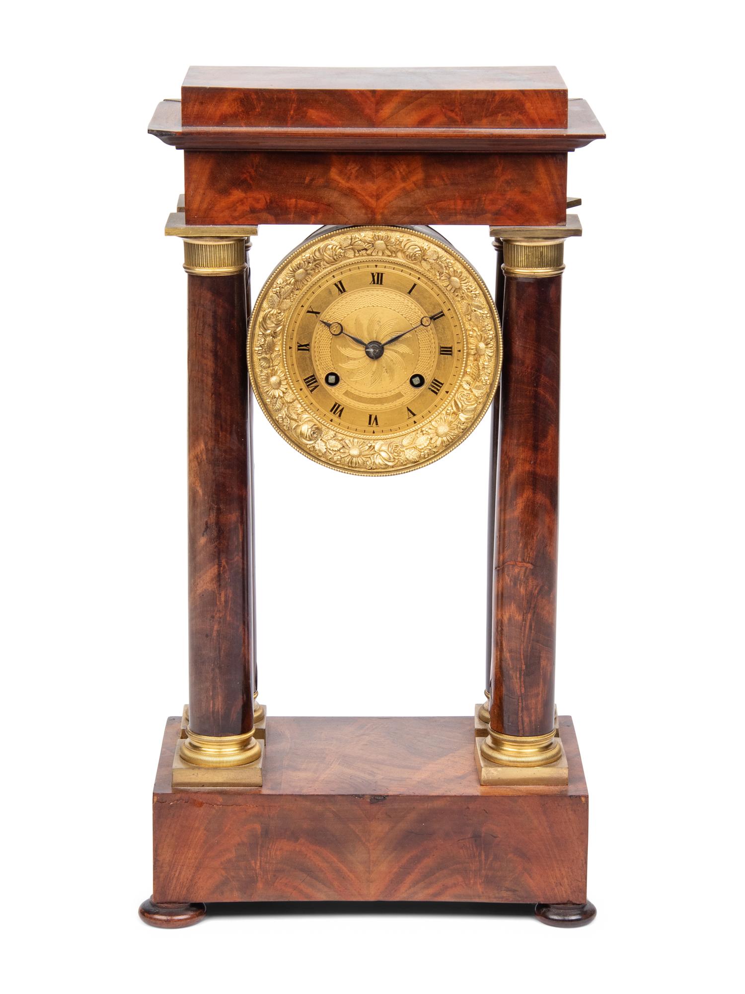 A Charles X Gilt Bronze Mounted Mahogany Portico Clock