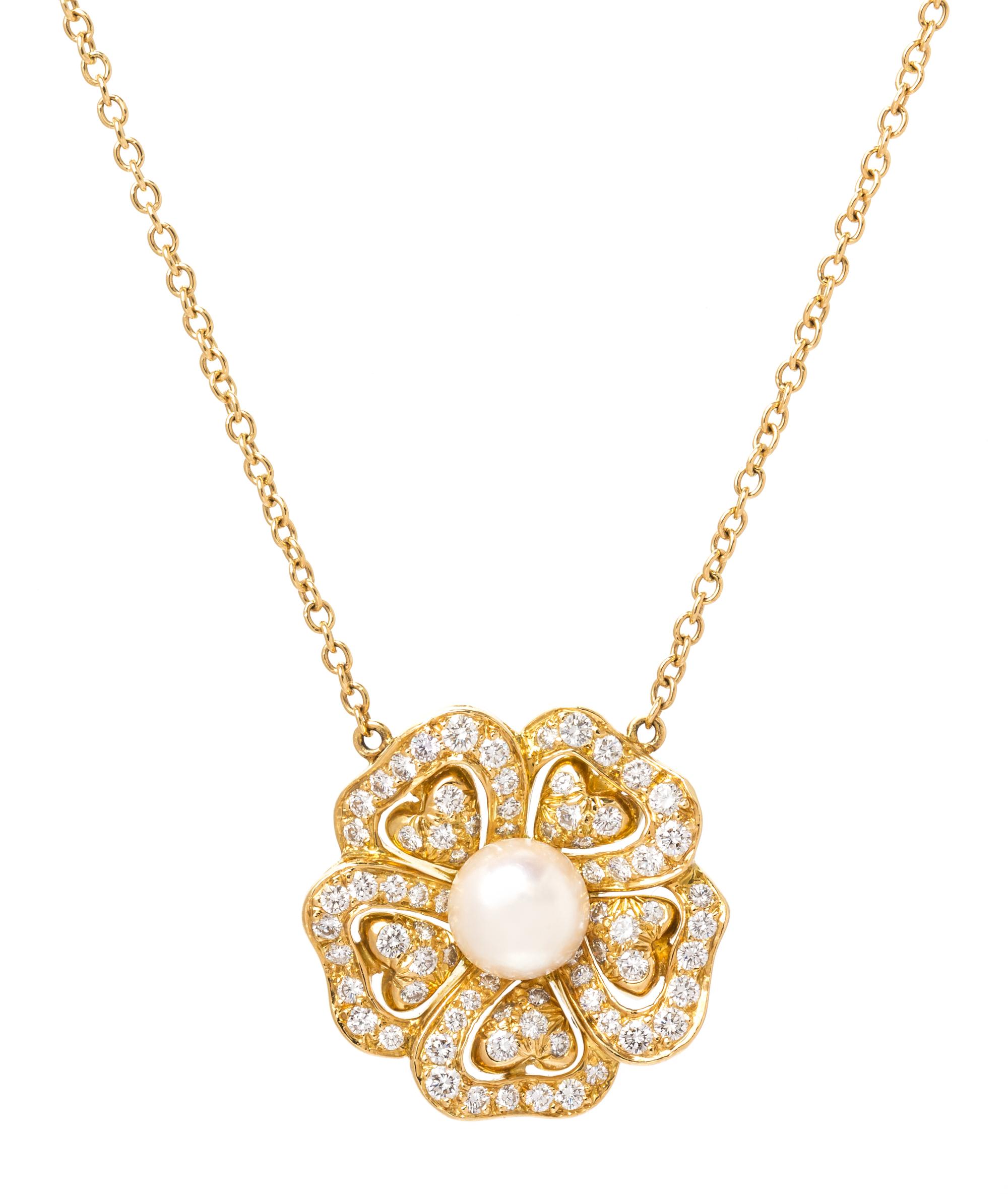 An 18 Karat Yellow Gold, Cultured Pearl and Diamond Floral Motif Necklace, 6.90 dwts.