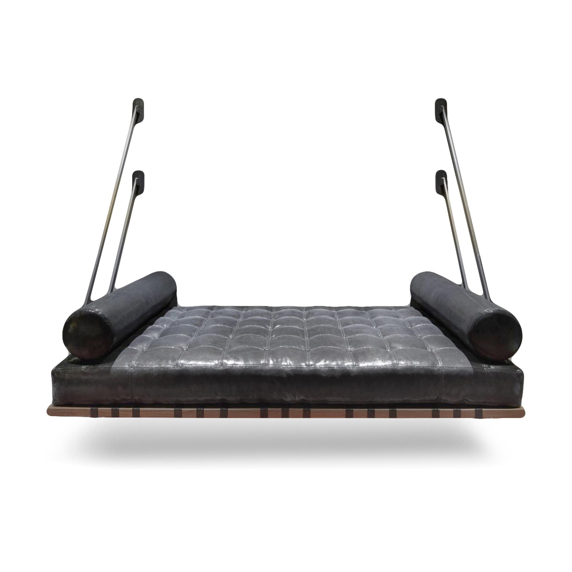 A Carson Maddox Patinated Metal and Keleen Leather Upholstered Daybed