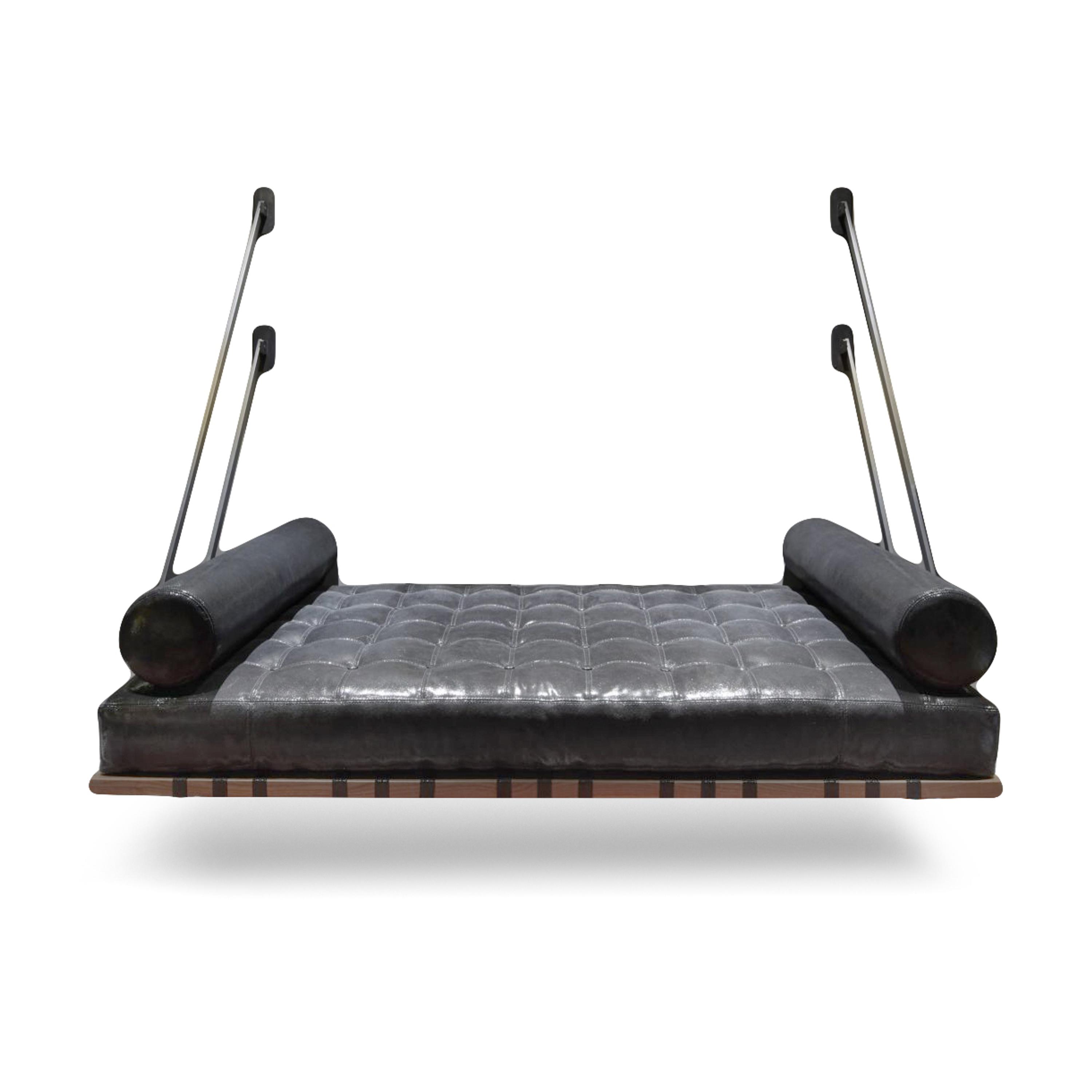 A Carson Maddox Patinated Metal and Keleen Leather Upholstered Daybed