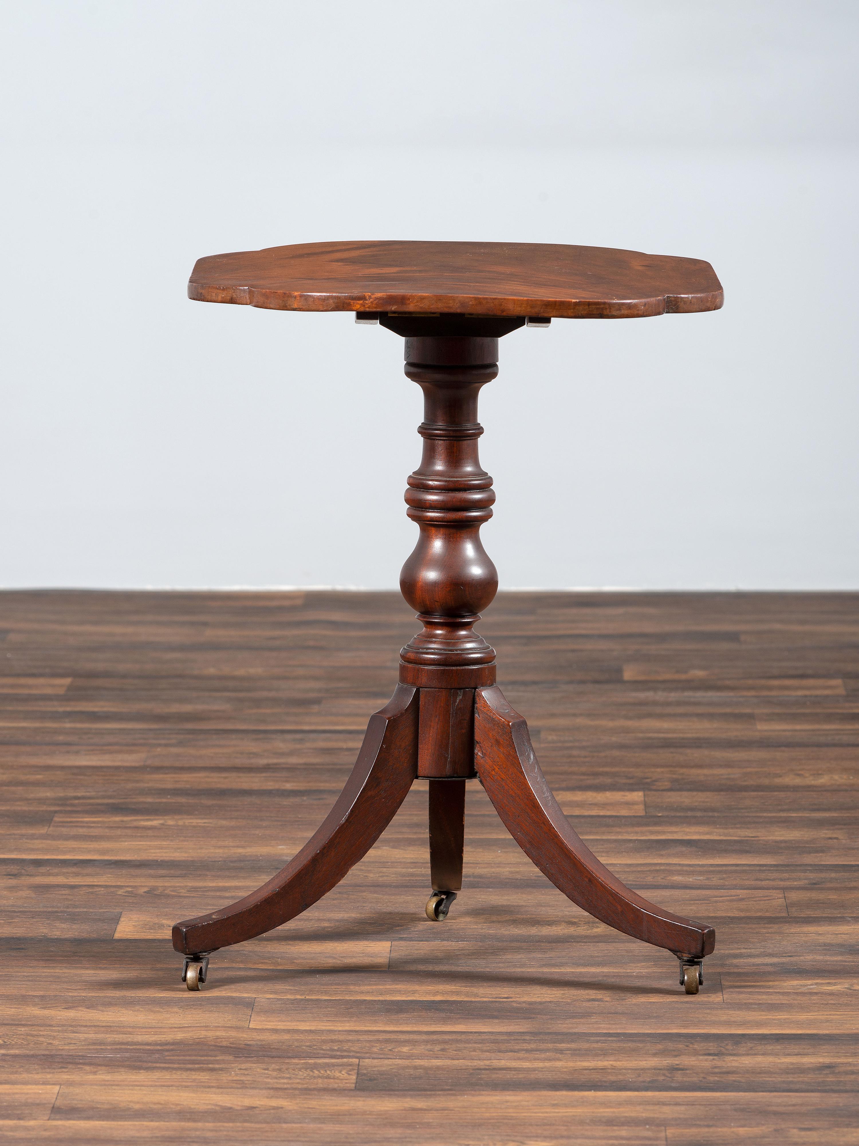 A Late Chippendale Figured Mahogany Tablet Tilt-Top Candlestand
