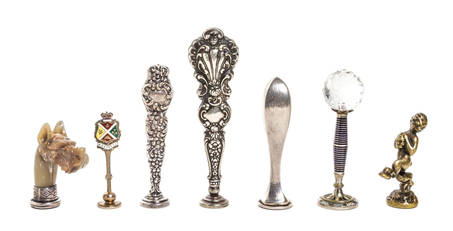 A Collection of Seven Silver, Silver Mounted or Brass Seals, Height of tallest 4 3/8 inches.