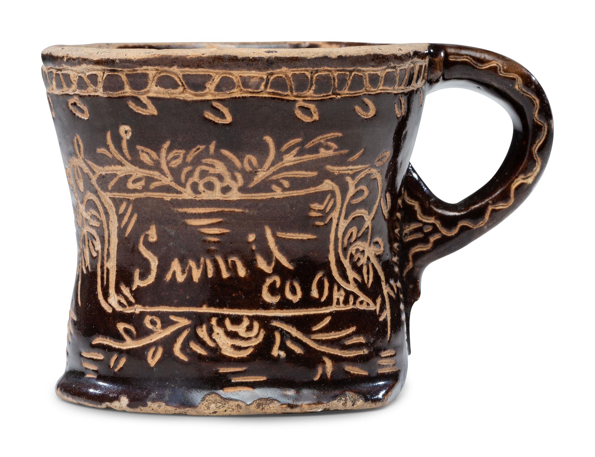 A Slip-Glazed and Incised Mug