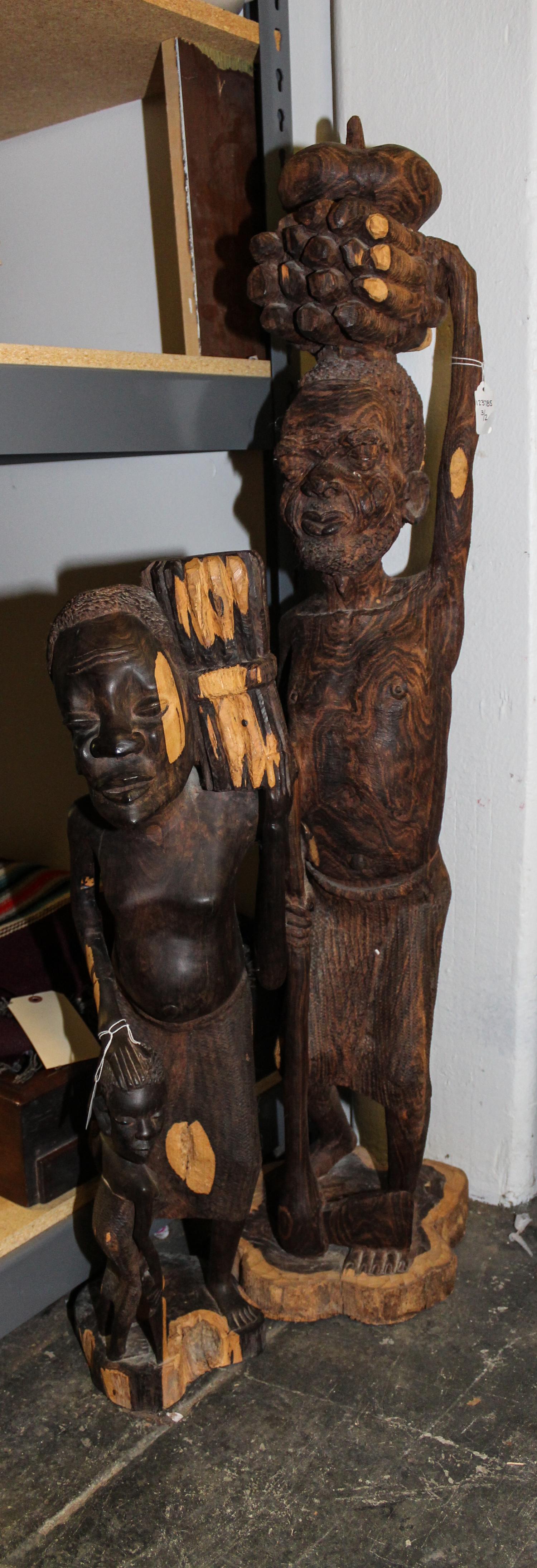 Two African Carved Wood Figures. Height of taller 42 inches.