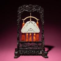 A Chinese White Jade Chime-Form Pendant, 18th/19th Century — 清中期 白玉罄