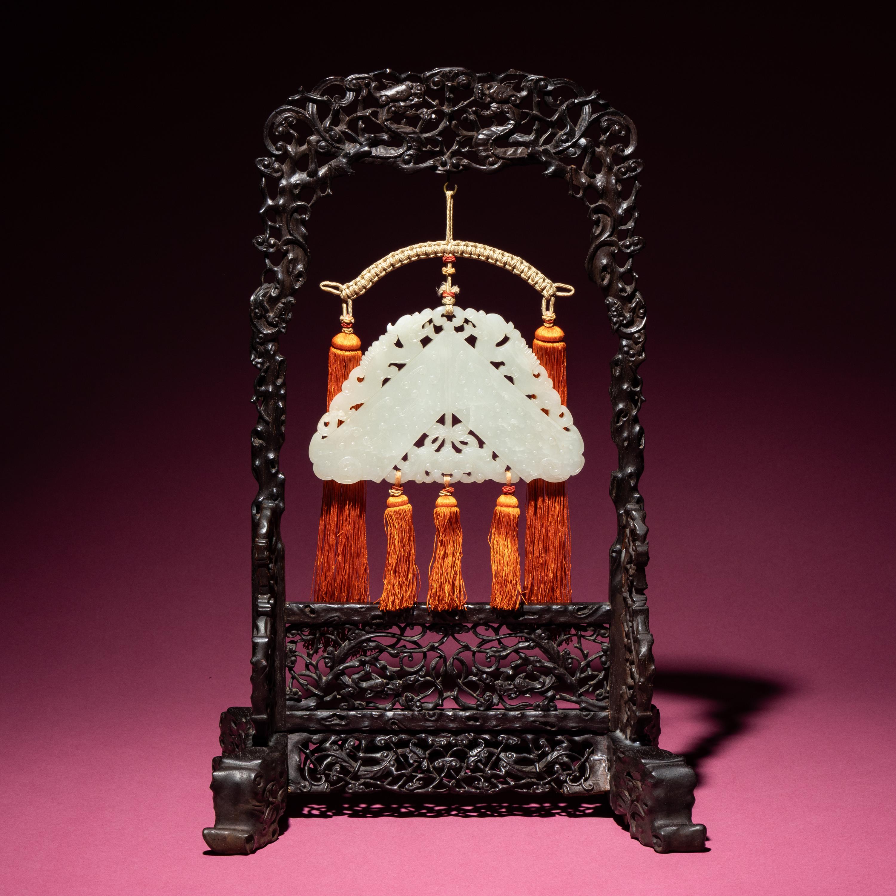 A Chinese White Jade Chime-Form Pendant, 18th/19th Century — 清中期 白玉罄
