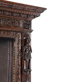 An Austrian Carved Walnut Cabinet