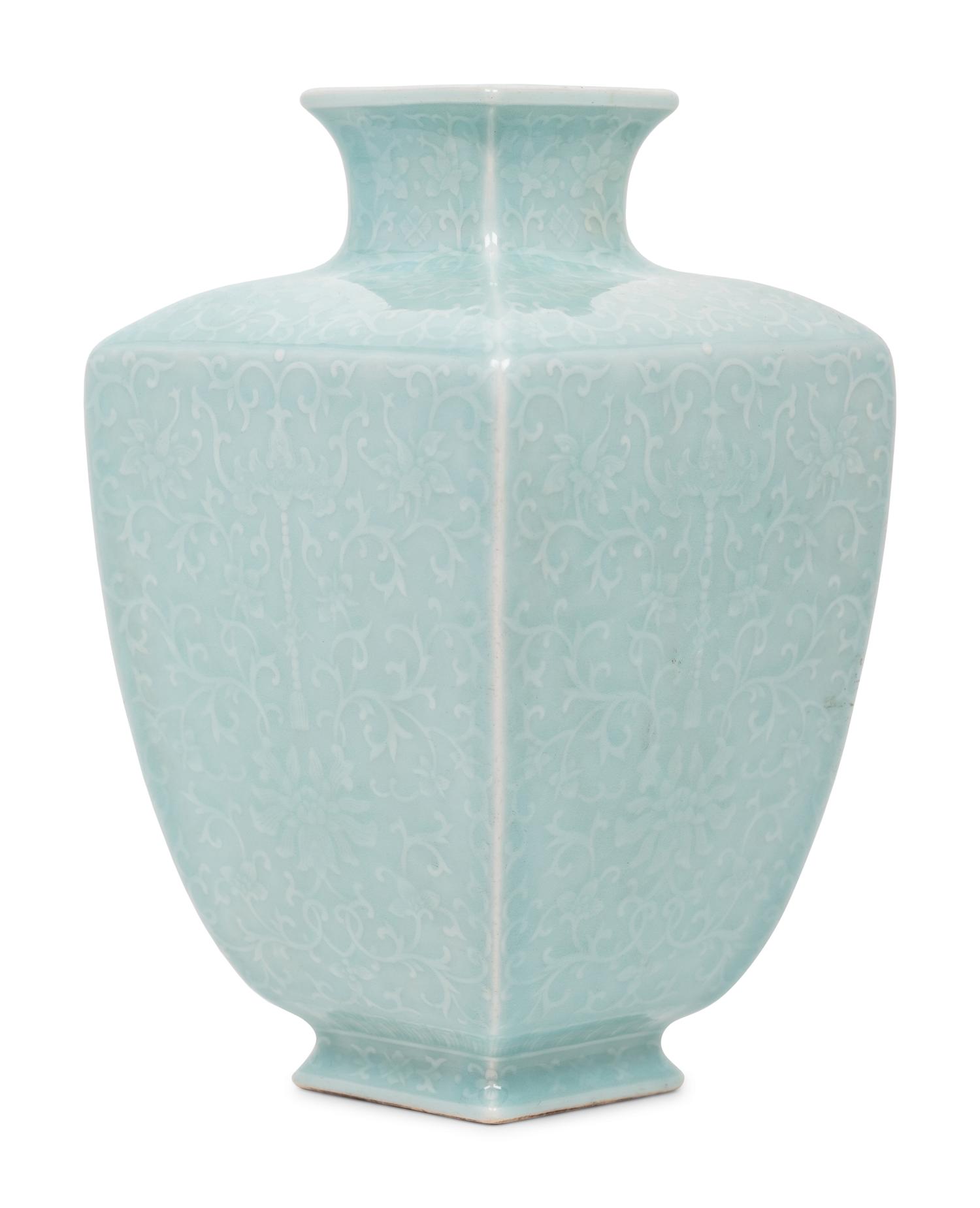 A Chinese Carved Celadon Glazed Porcelain 'Lotus' Vase