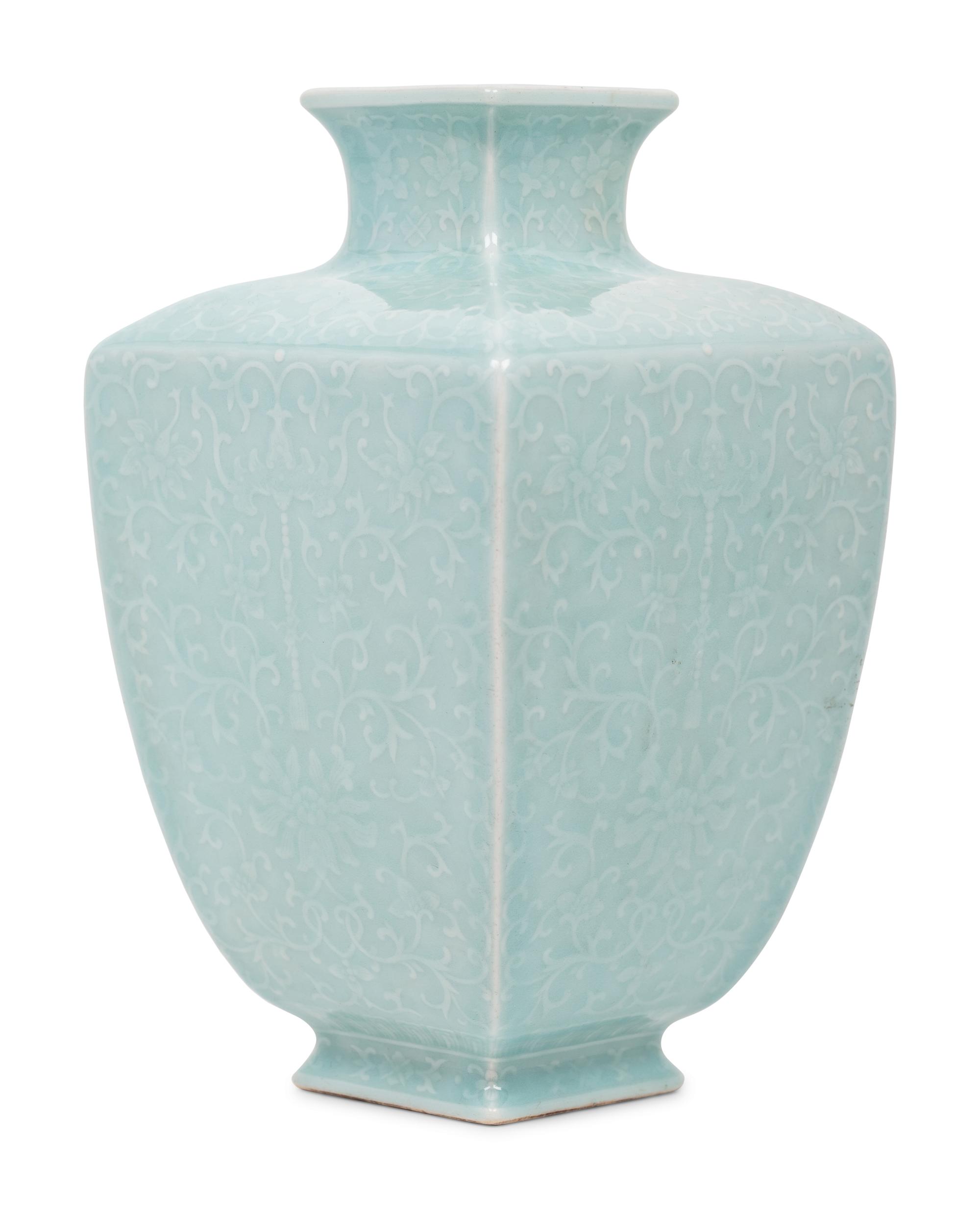 A Chinese Carved Celadon Glazed Porcelain 'Lotus' Vase