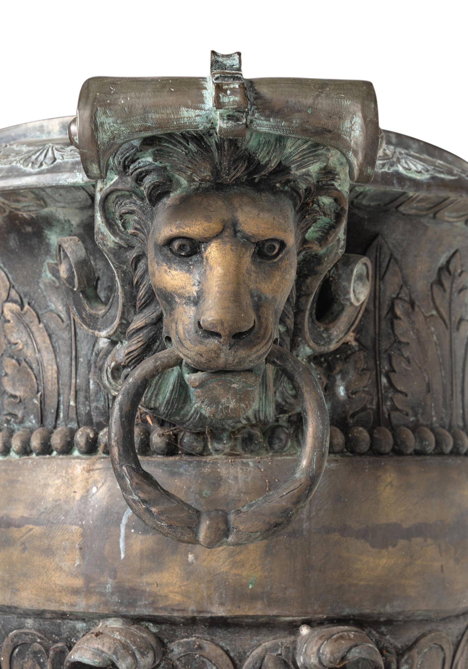 A Pair of Cast Metal Garden Urns