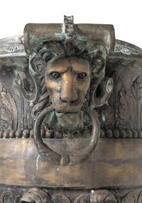 A Pair of Cast Metal Garden Urns