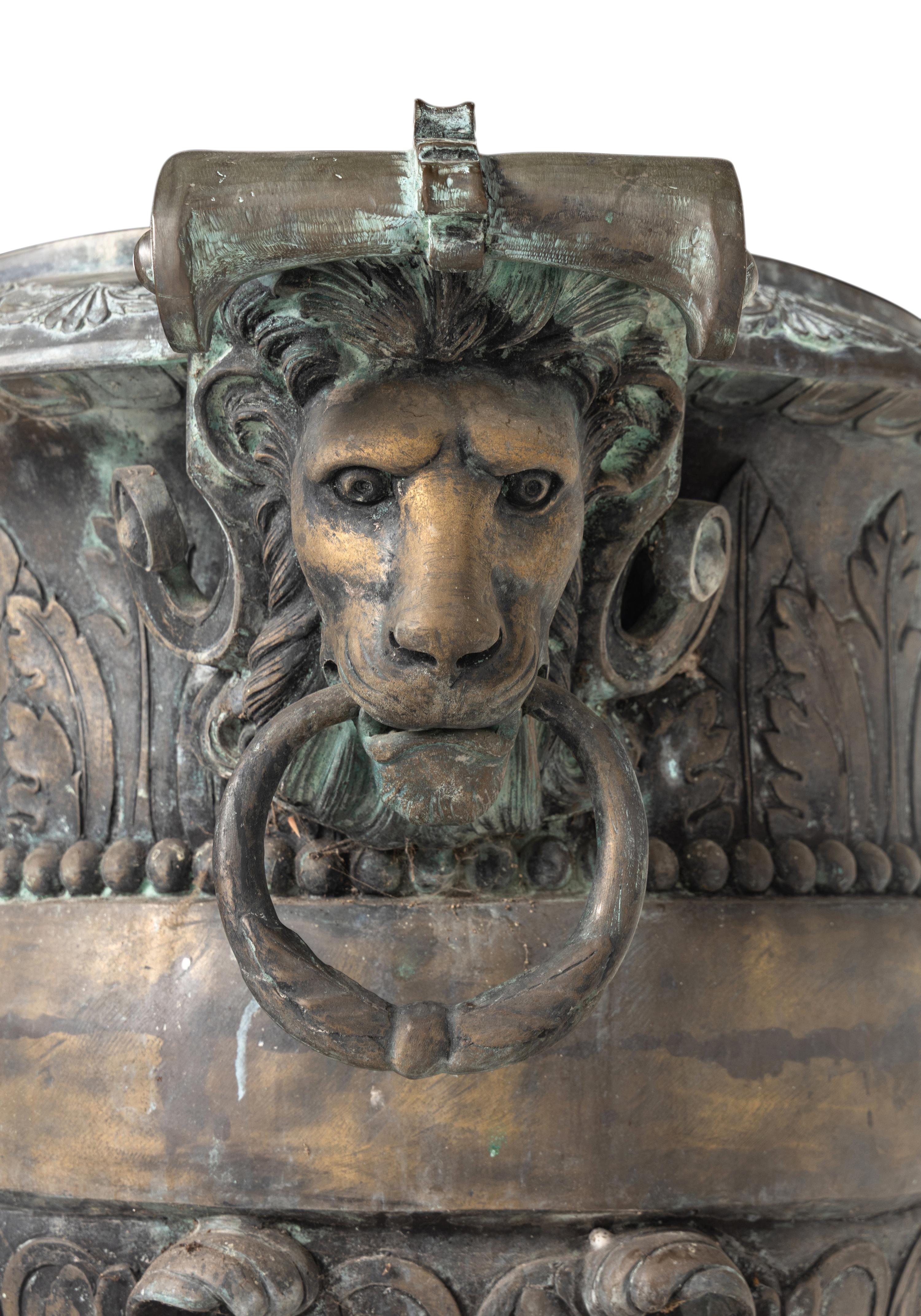 A Pair of Cast Metal Garden Urns