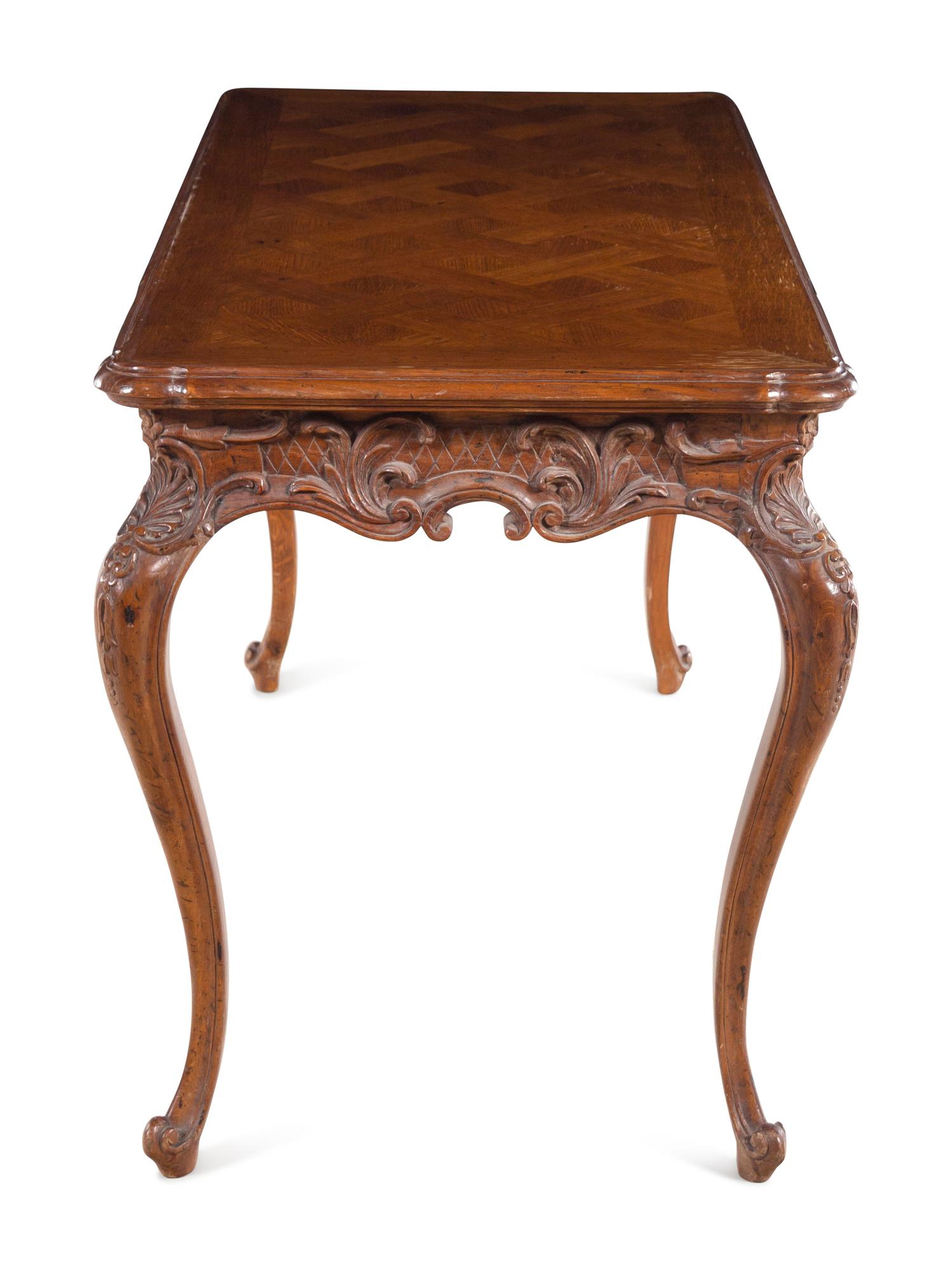A Louis XV Style Writing Table and an Associated Dutch Marquetry Chair