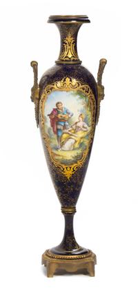A Gilt Bronze Mounted Sevres Style Porcelain Urn Height 23 inches.