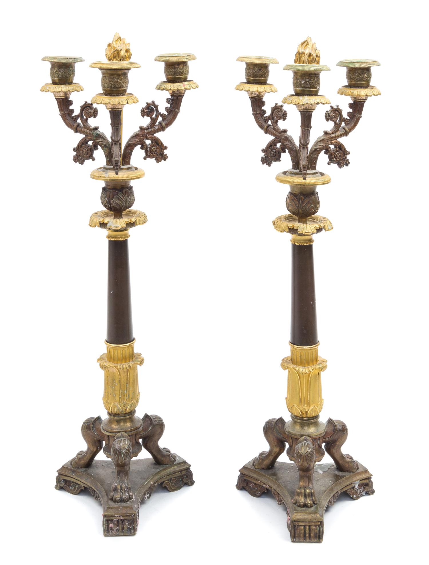 A Pair of Louis Philippe Style Gilt and Patinated Bronze Three-Light Candelabra Height 20 inches. — LATE 19TH CENTURY