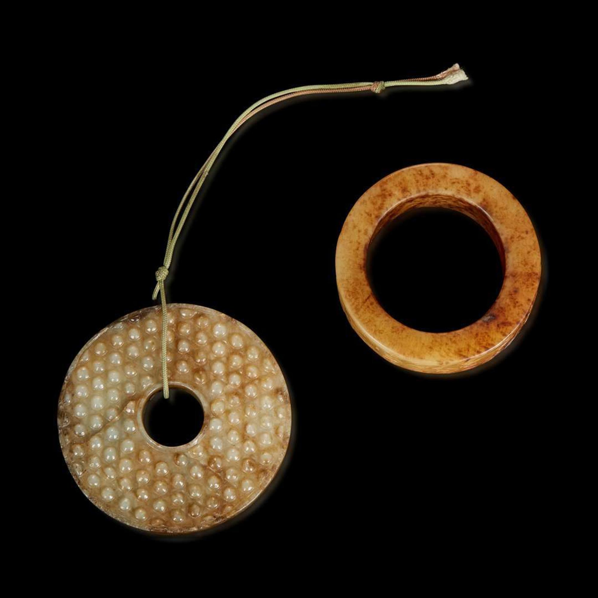 A Chinese archaistic carved beige jade bi and a large ring 高古風格玉璧與玉環各一件