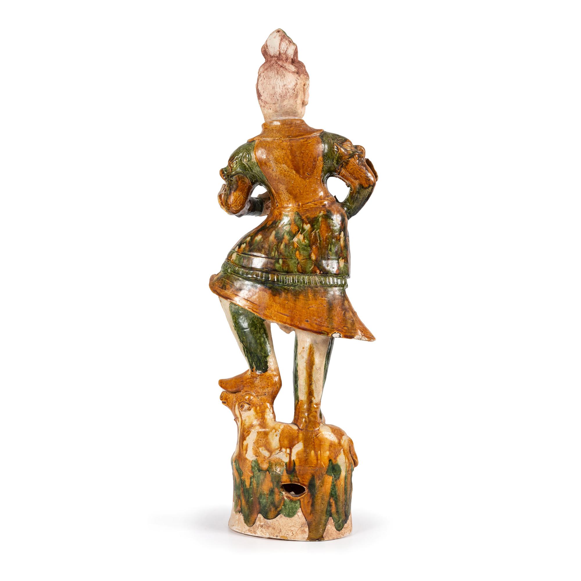 A Monumental Chinese Sancai Warrior Figure