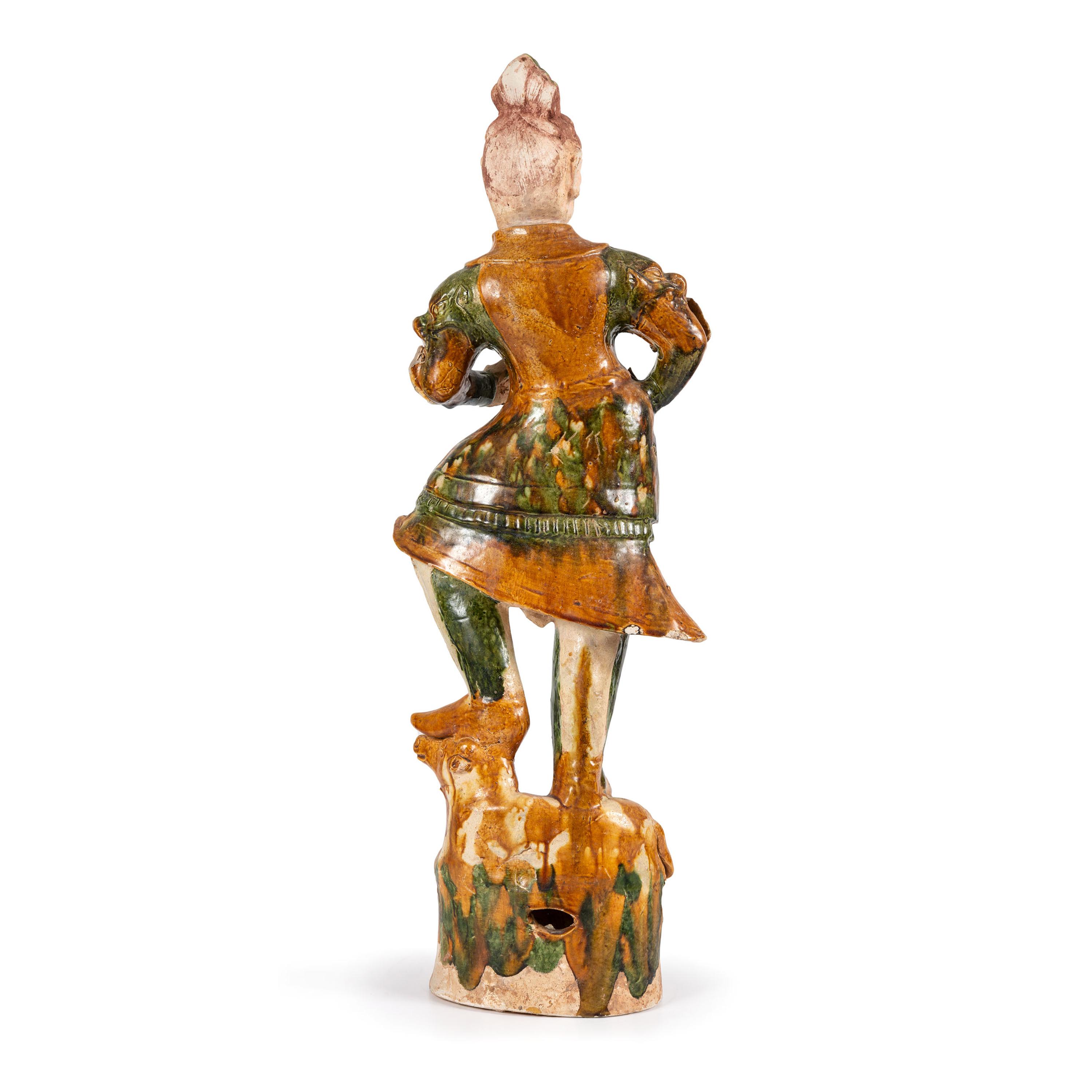 A Monumental Chinese Sancai Warrior Figure