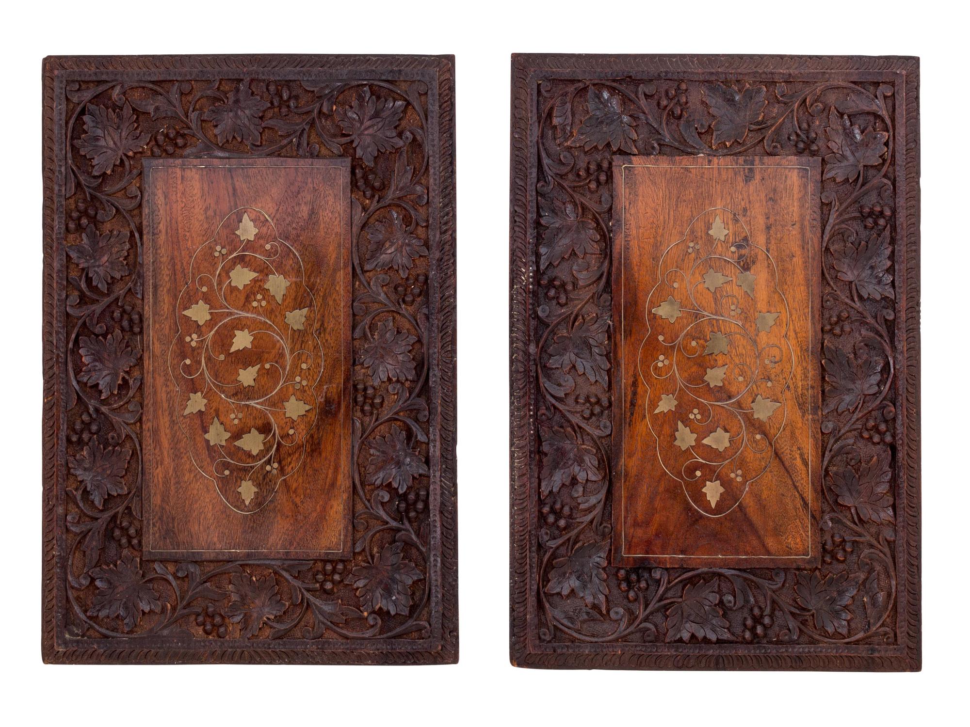 A Pair of Continental Carved Walnut and Brass Inlaid Panels