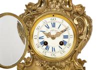 A Louis XV Style Gilt Metal Clock Garniture — LATE 19TH/EARLY 20TH CENTURY