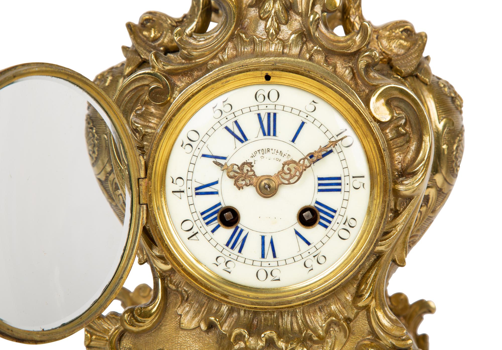A Louis XV Style Gilt Metal Clock Garniture — LATE 19TH/EARLY 20TH CENTURY
