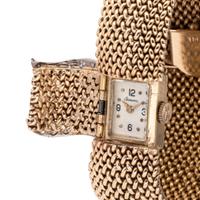 14K YELLOW GOLD AND DIAMOND SURPRISE WATCH