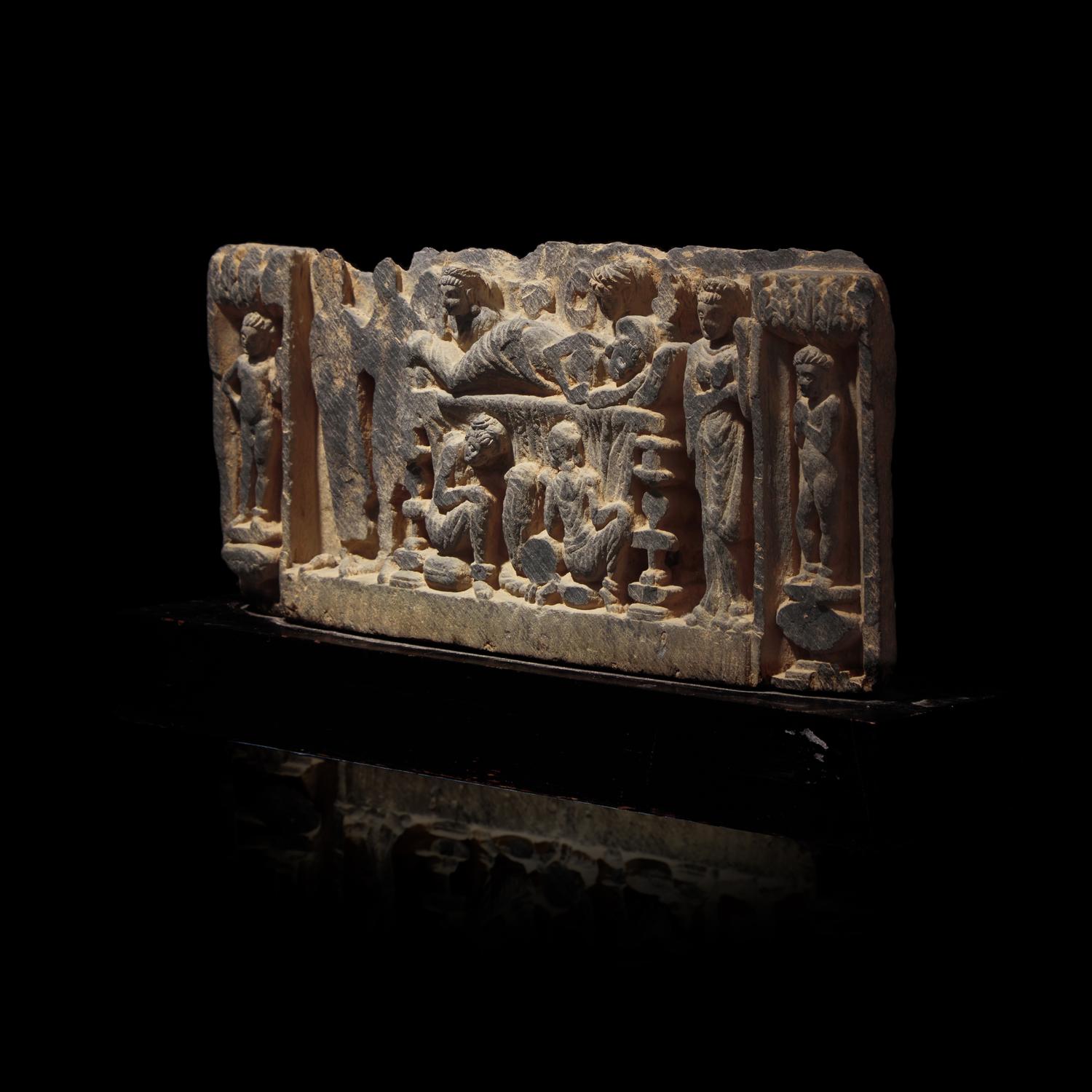A Gandharan Grey Schist Relief with Maya, 2nd/3rd Century