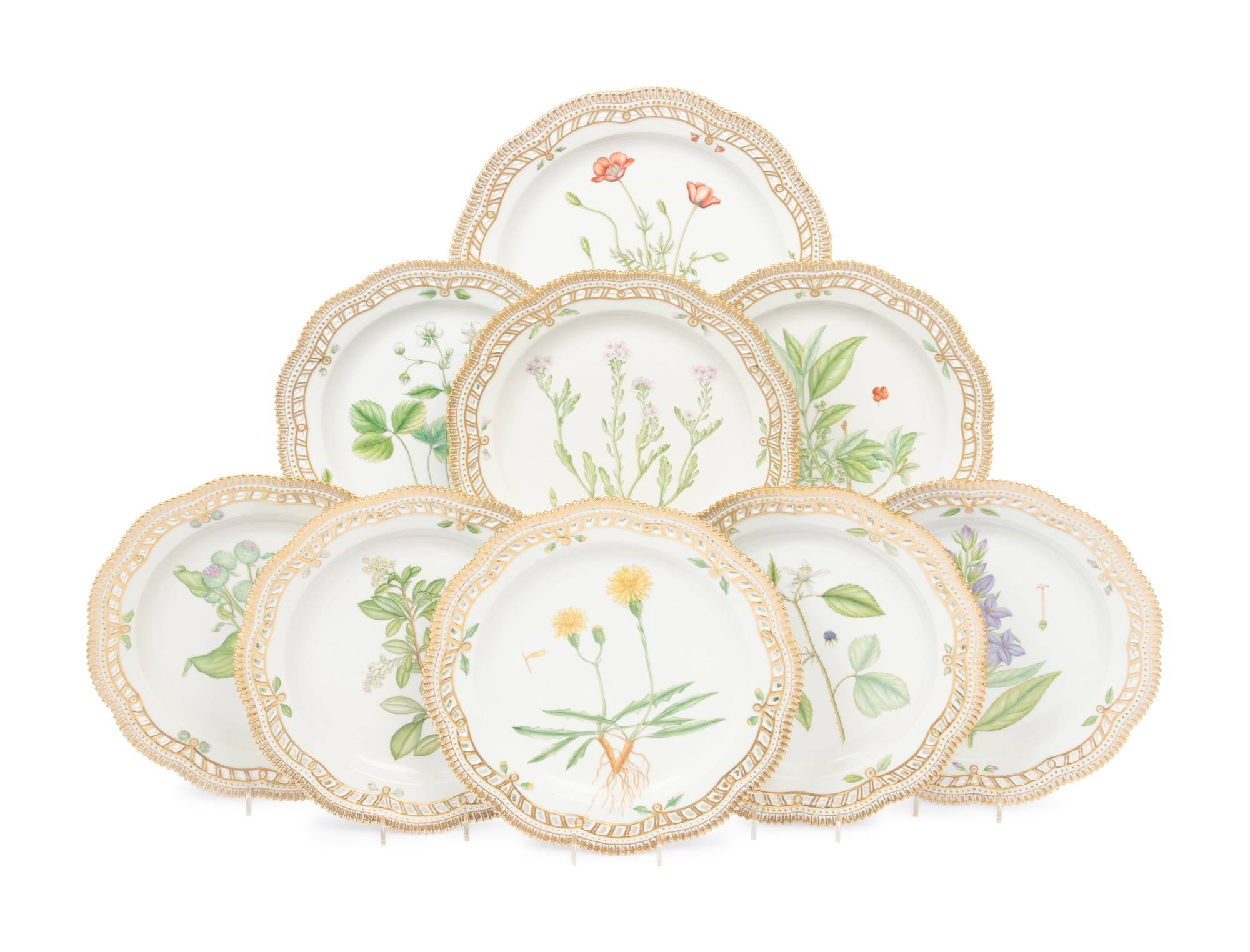 A Group of Eight Royal Copenhagen Flora Danica Reticulated Porcelain Dinner Plates and a Serving Dish