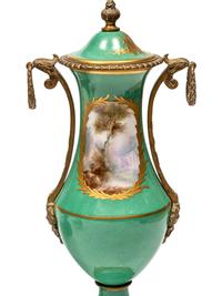 A Gilt Metal Mounted Sèvres Style Porcelain Three-Piece Garniture