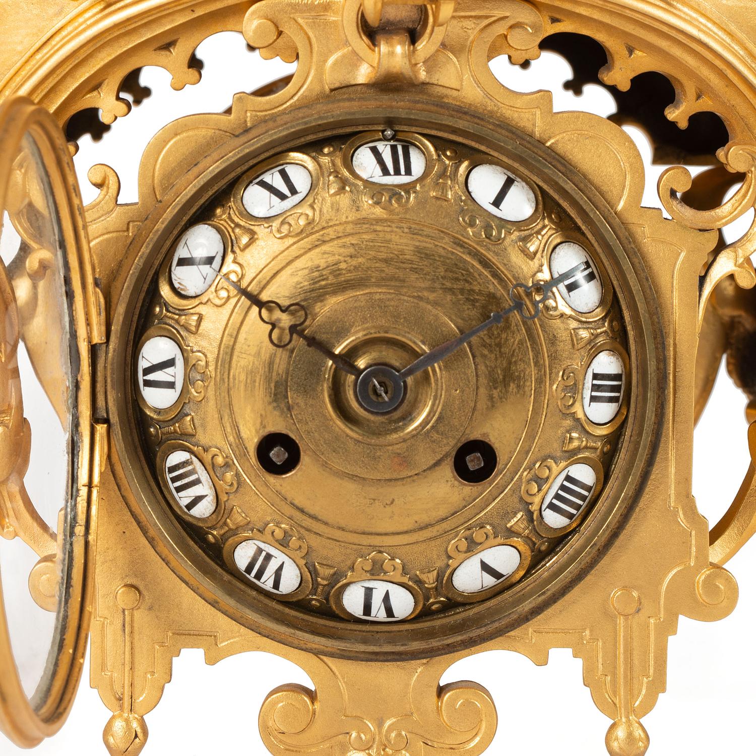A French Neoclassical Gilt Metal Mantel Clock