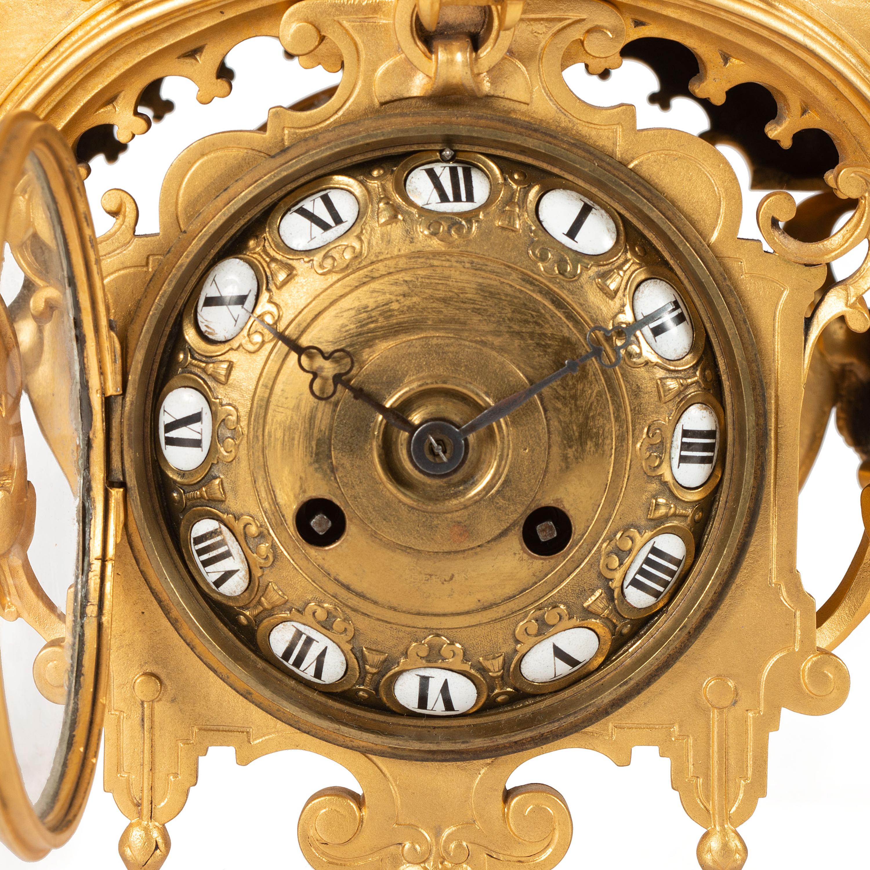 A French Neoclassical Gilt Metal Mantel Clock