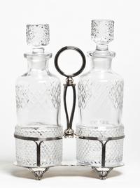A Victorian Silver-plate Decanter Set, Martin, Hall & Co., Sheffield, England Height 12 x width 8 1/2 x depth 4 inches.