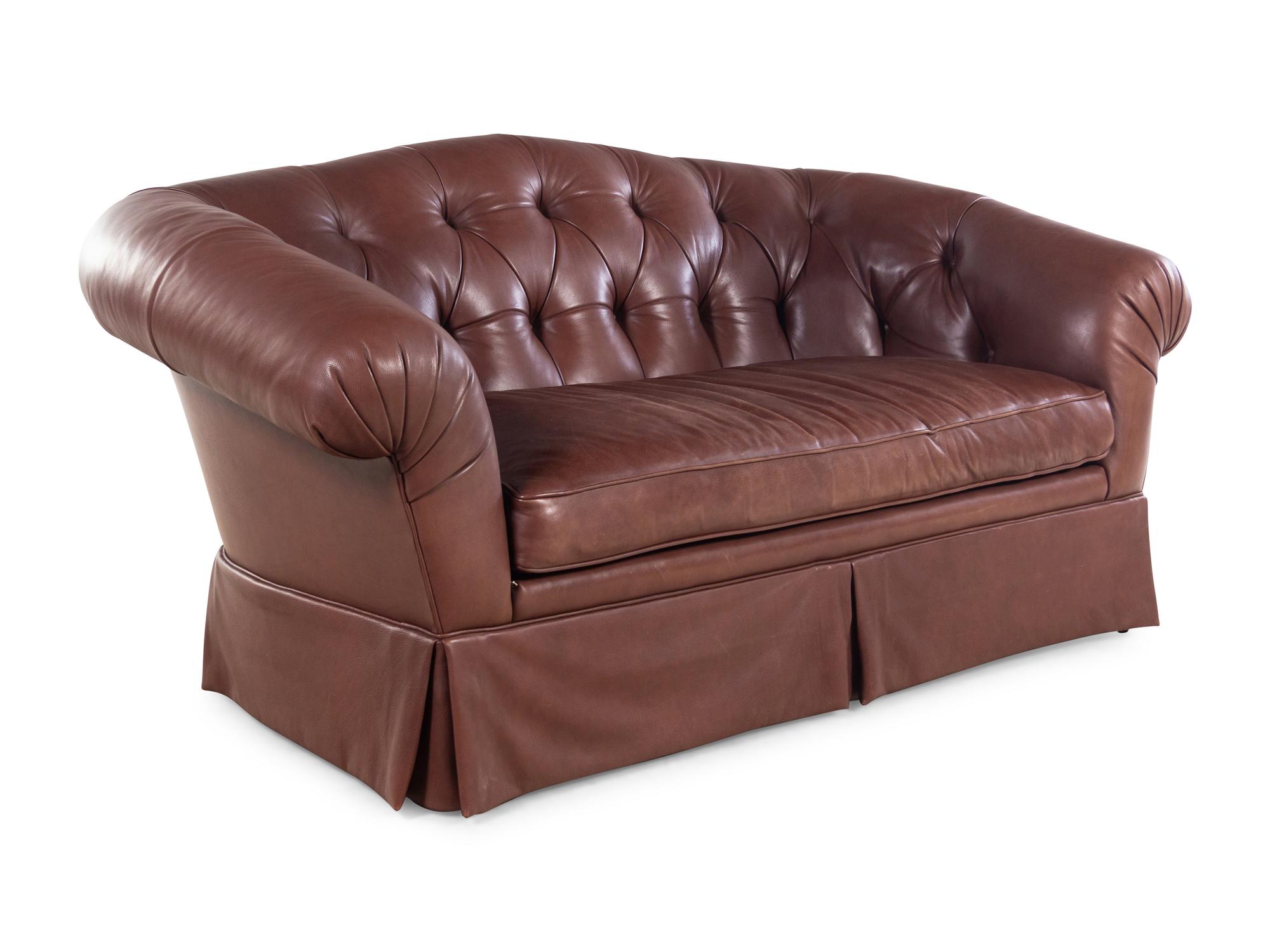 A Leather Upholstered Chesterfield Sofa