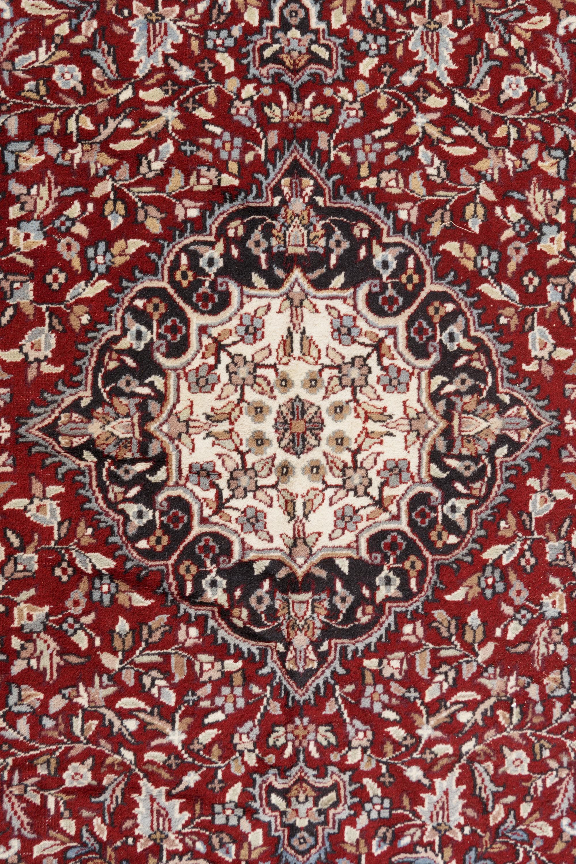 A Tabriz Style Wool Rug