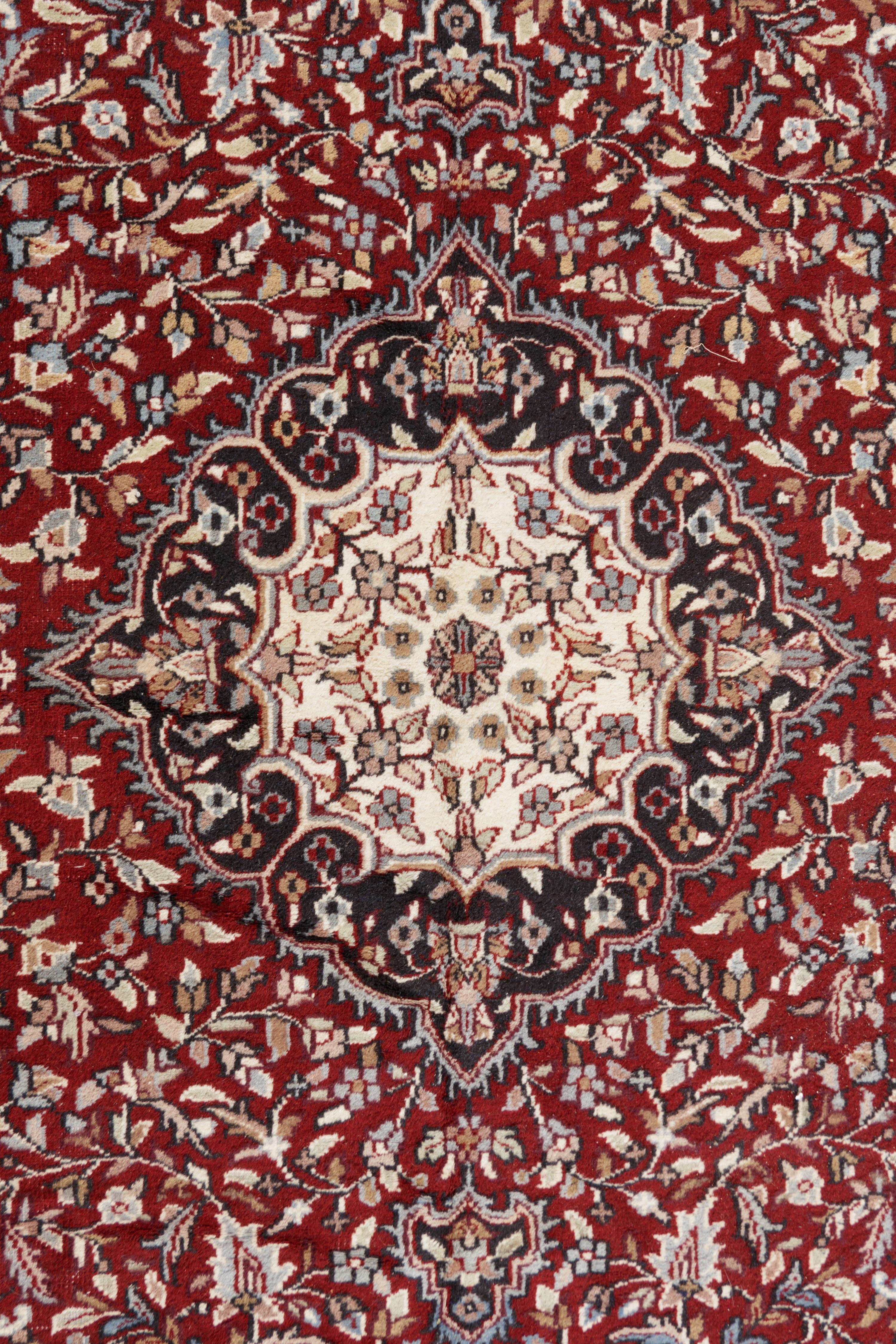A Tabriz Style Wool Rug