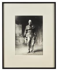A Group of Three Photographs