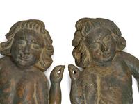 A Pair of Continental Carved and Painted Wood Putti