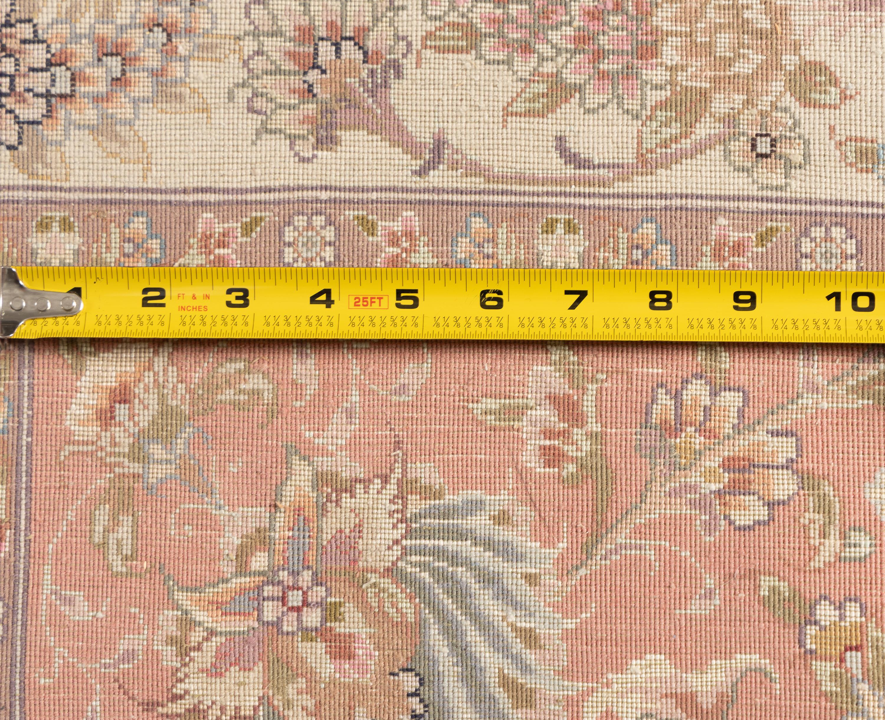 A Tabriz Silk Carpet