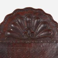 A carved mahogany and tooled leather Campeche chair Mexico, late 18th / early 19th century