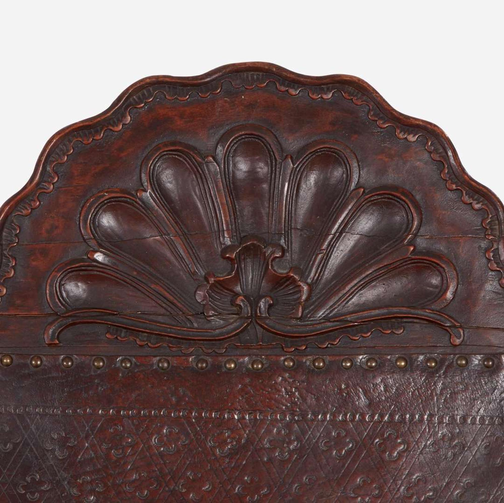 A carved mahogany and tooled leather Campeche chair Mexico, late 18th / early 19th century