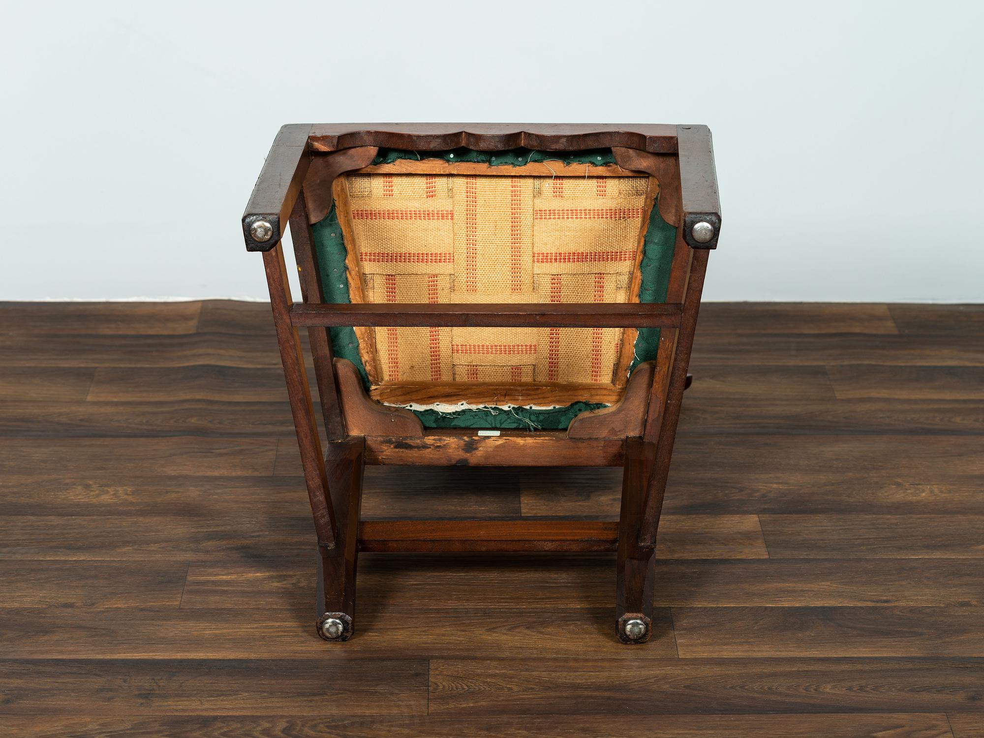 A Set of Six Chippendale Volute-Carved Mahogany Side Chairs