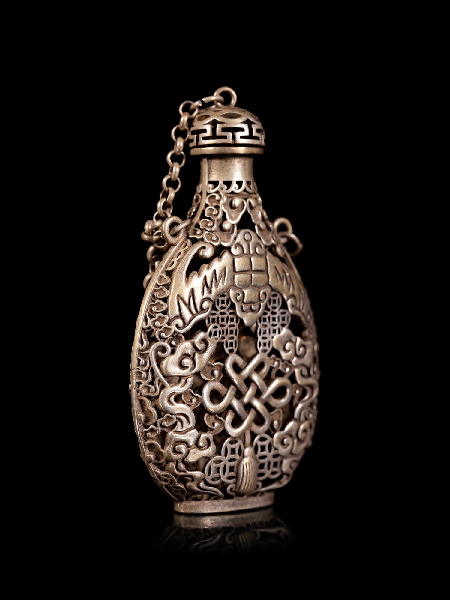 A Chinese Reticulated Silver Snuff Bottle